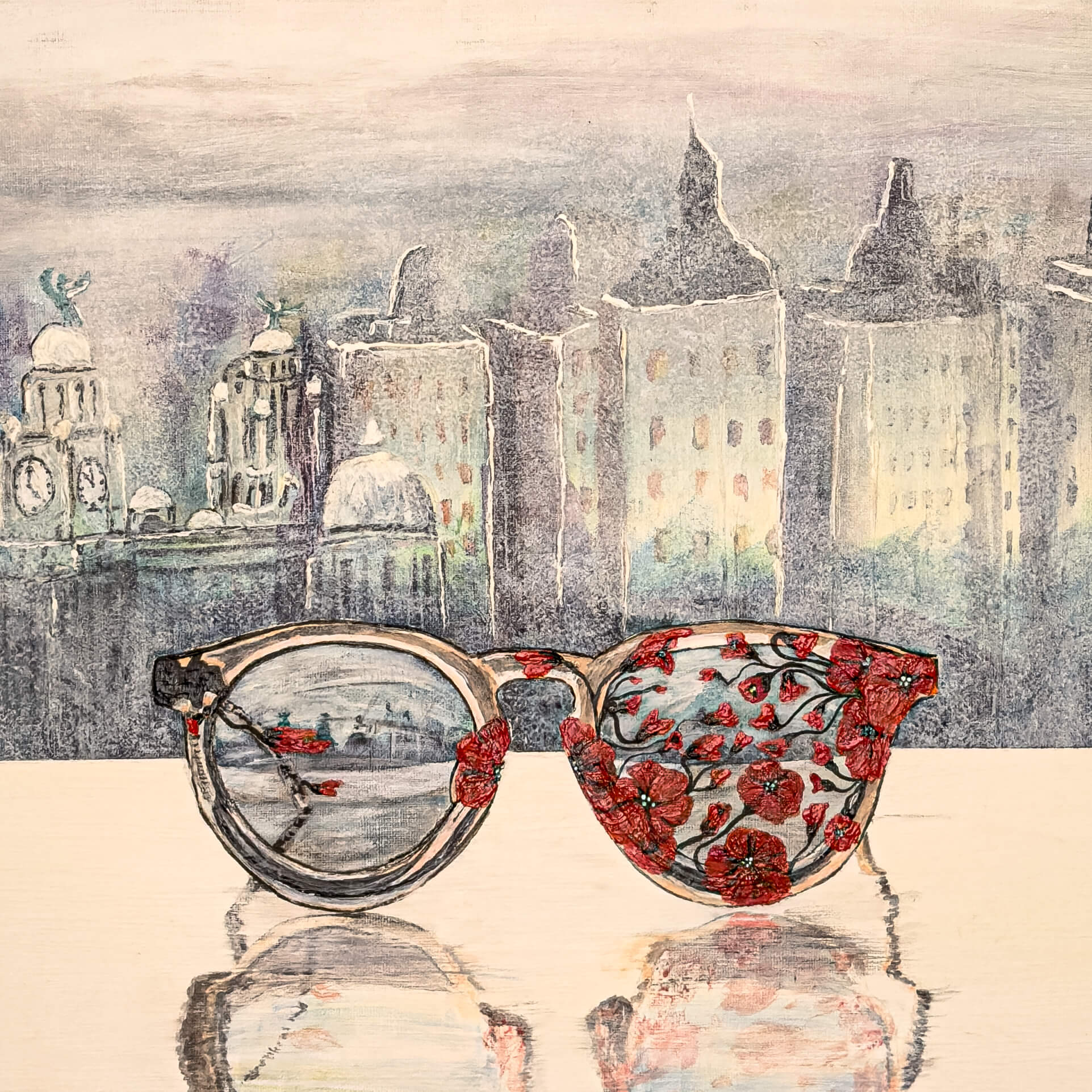 Close up of an acrylic painting of glasses covered by poppies, in front of the Liverpool skyline, on canvas