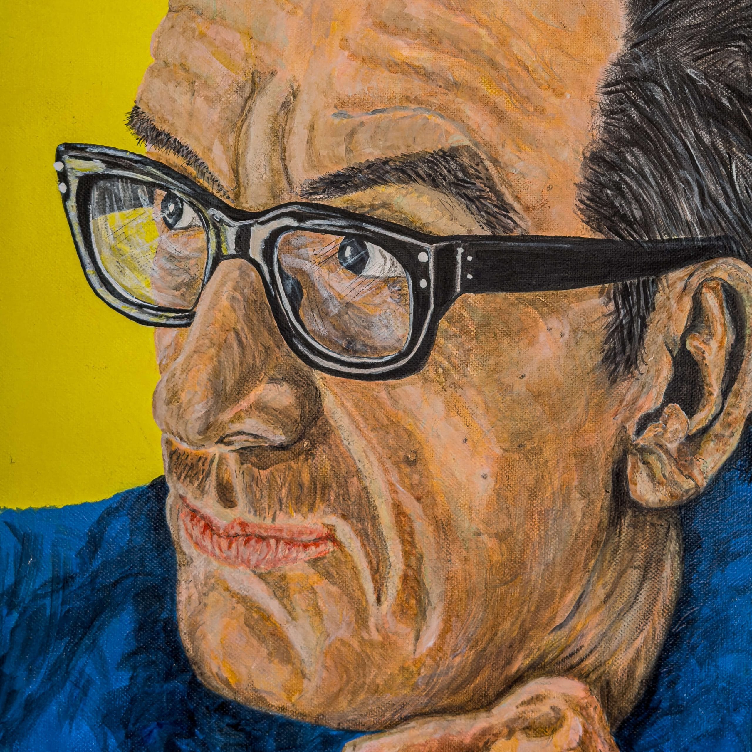 Close up of a painting of Elvis Costello in acrylic paint on canvas