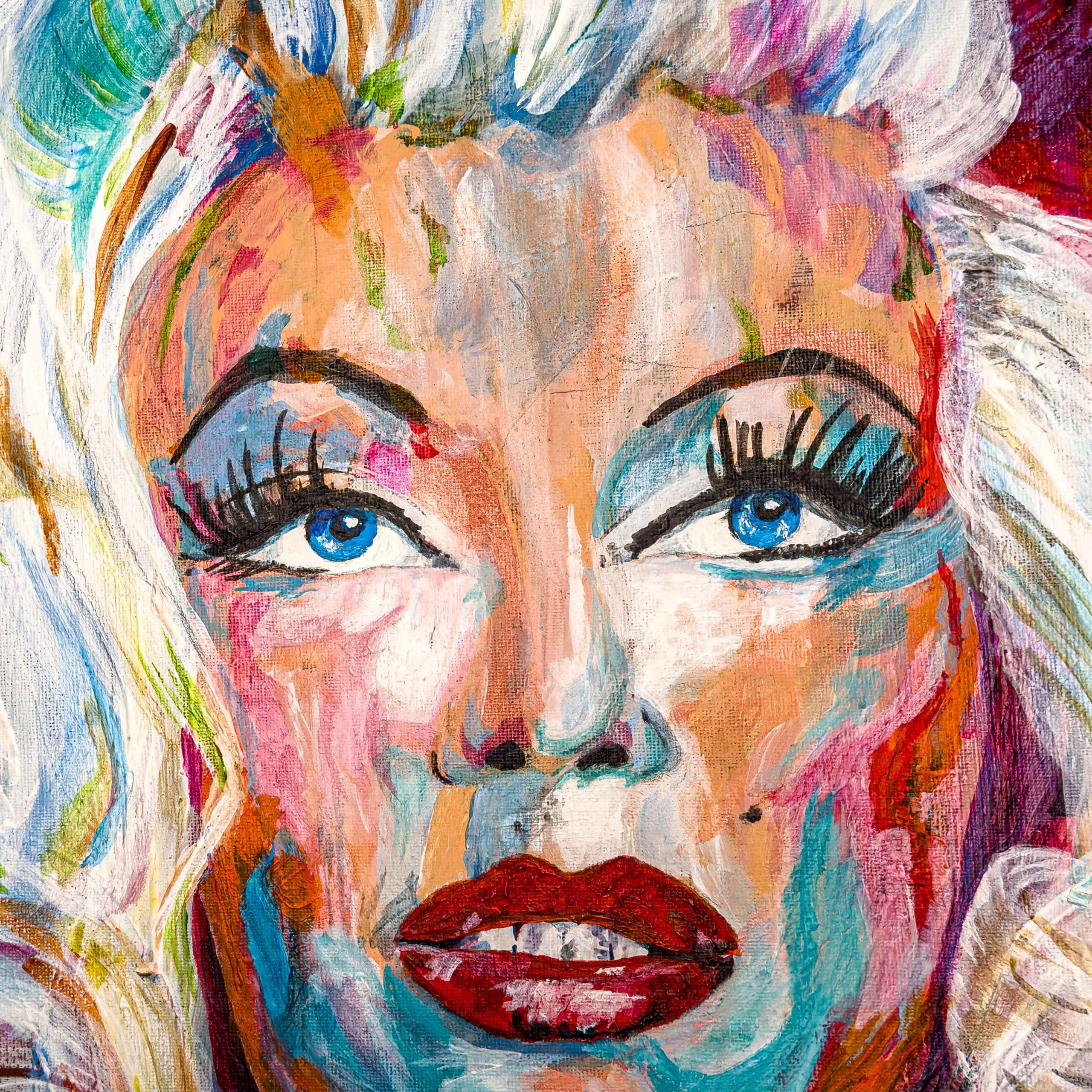 Close up of a painting of Marilyn Monroe in acrylic paint on card